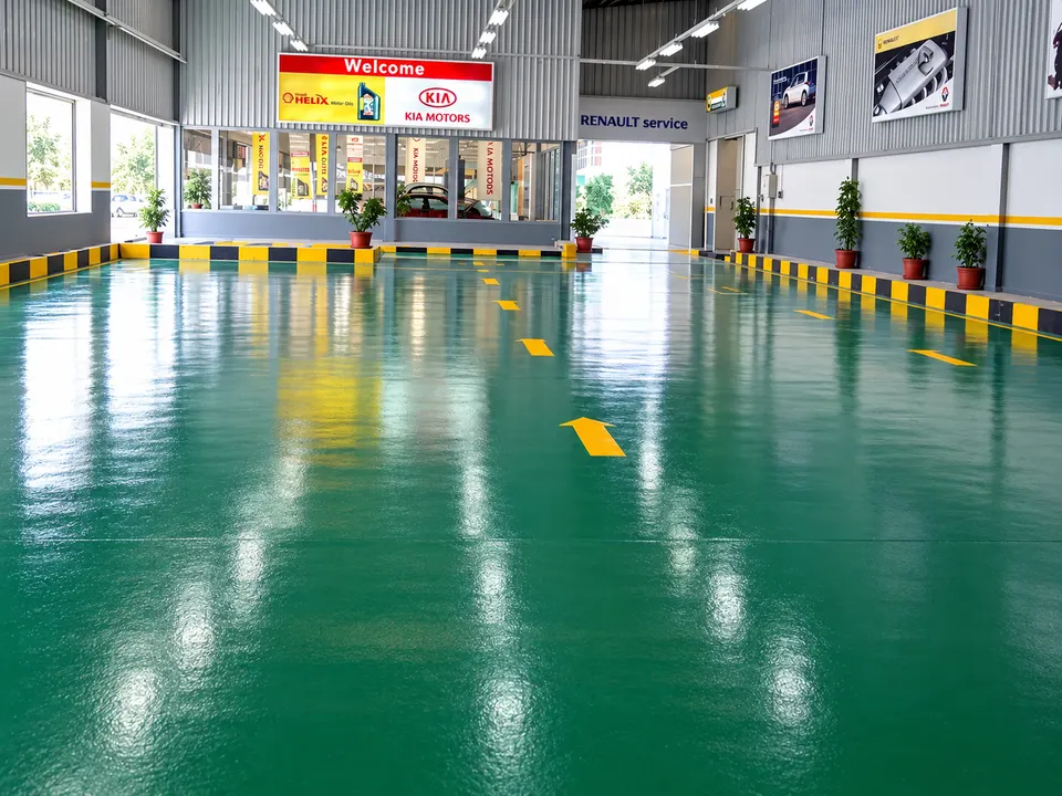 Green resin floor in vehicle/service bay
