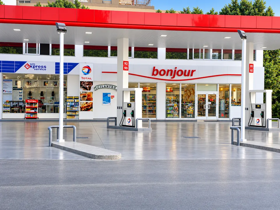 Grey service-station forecourt at retail fuel site